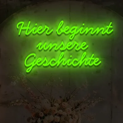 led-schriftzug-hier-beginnt-unsere-geschichte-gruen 1