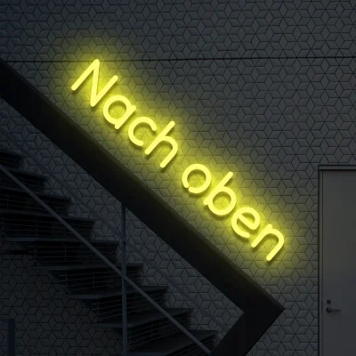 neon-schriftzug-nach-oben-gelb 1